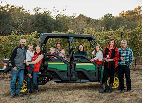 Bacigalupi family in vinyard with ATV