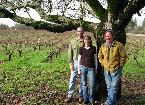 Carlisle owners Mike and Kendall Officer and Winemaker Jay Maddox