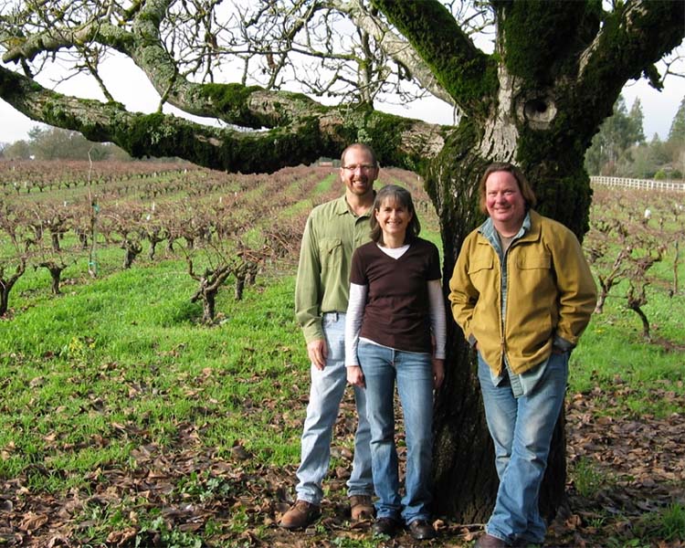 Carlisle owners Mike and Kendall Officer and Winemaker Jay Maddox